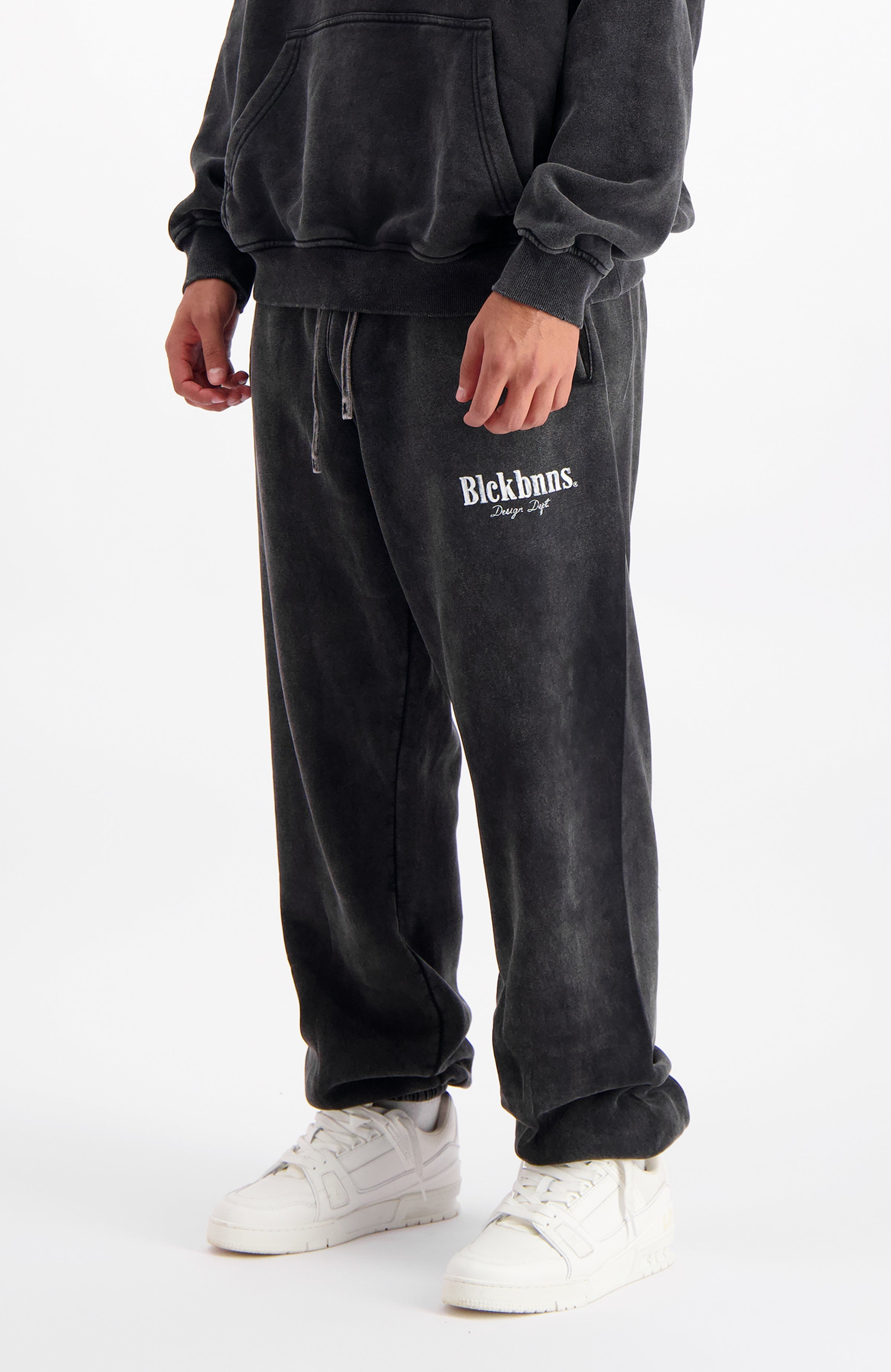 //blackbananas.com/cdn/shop/files/brush-sweatpants-1.224.4.46-000000-men-bottom-05_{width}x.jpg?v=1729872245