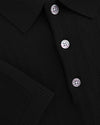 POLO DE PUNTO CON BANDAS | Negro