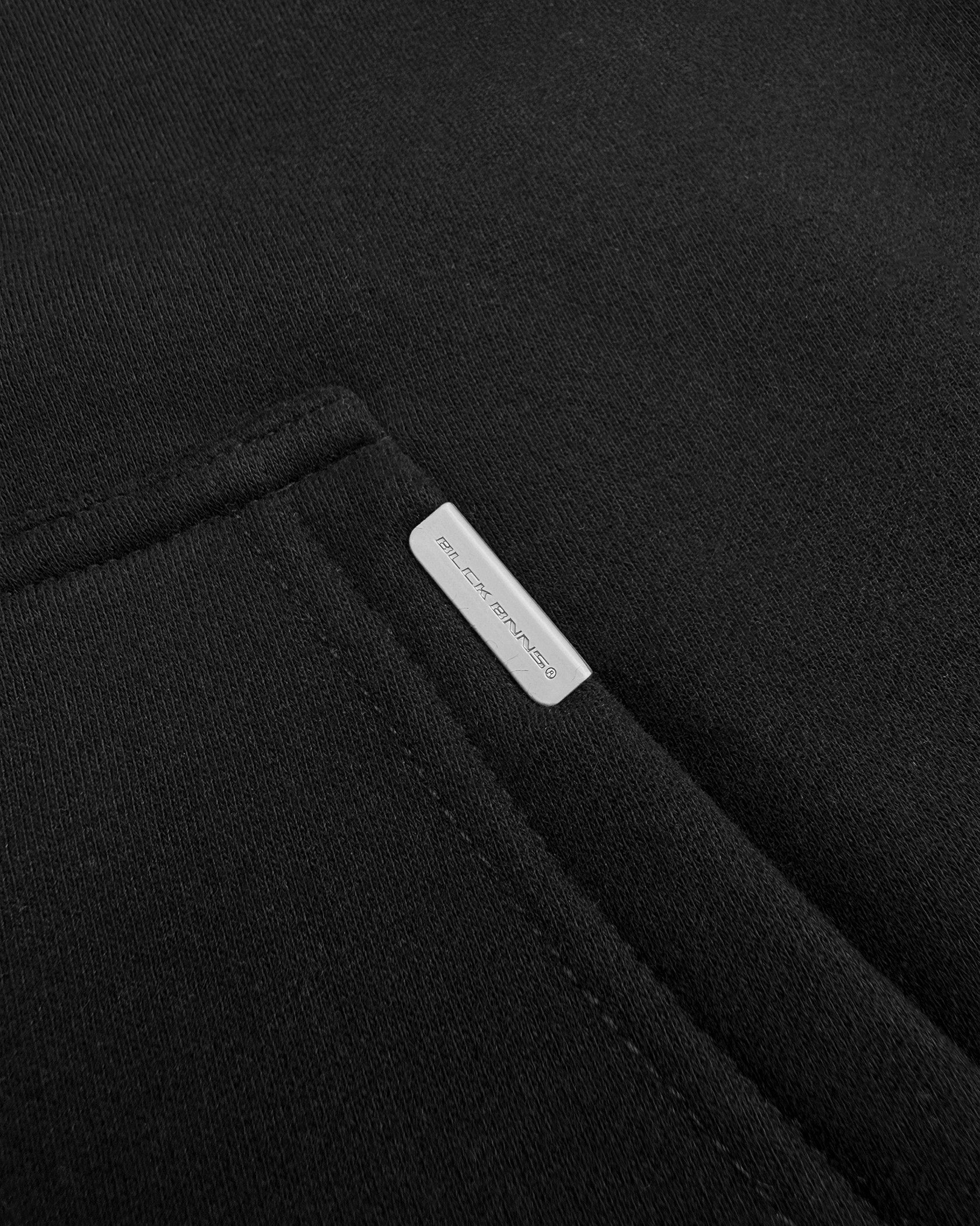 SUDADERA CON CREMALLERA RIPADA | Negra